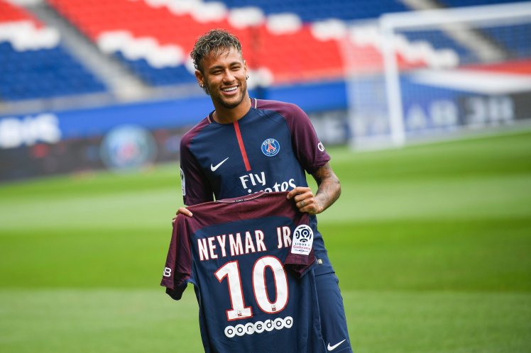 TOPSHOT – Brazilian superstar Neymar pos